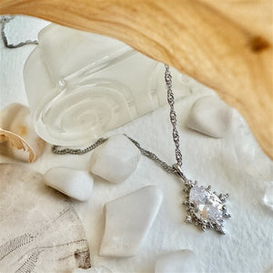 Cindel Teardrop Charm Necklace with Zircon Baguettes