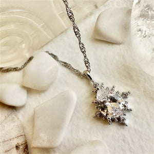 Cindel Teardrop Charm Necklace with Zircon Baguettes