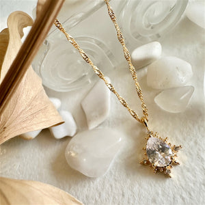 Cindel Teardrop Charm Necklace with Zircon Baguettes