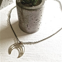 Load image into Gallery viewer, Nokomis Raw Brass Geometric Crescent Necklace
